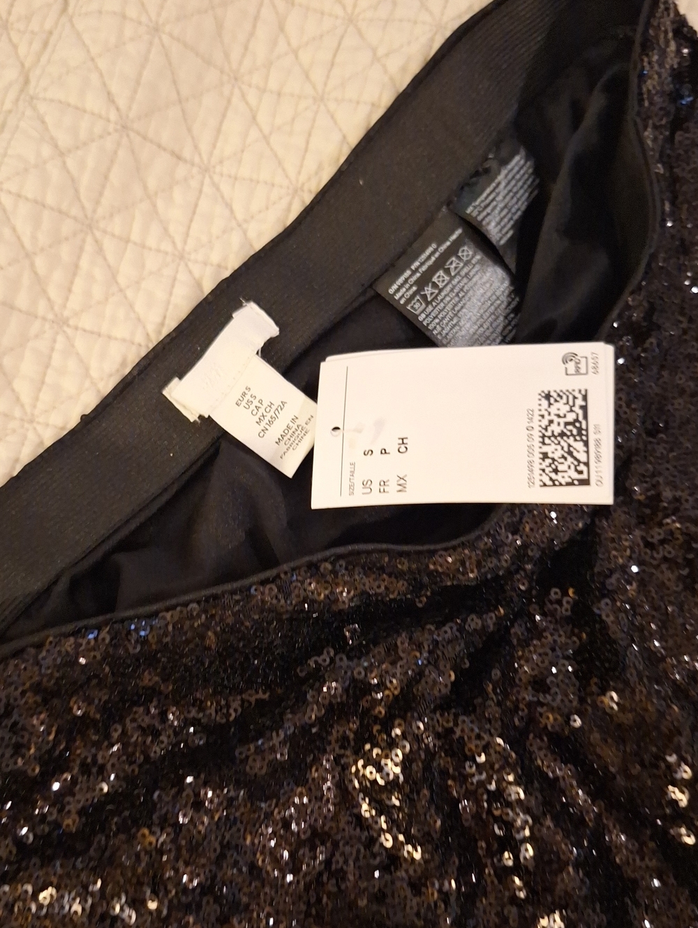 H&M Sequin Maxi Skirt in Black size S . underlining to the mid thigh.